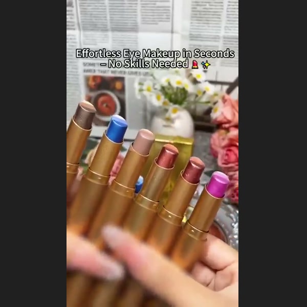 Three-color eyeshadow sticks demonstrated in a real setting