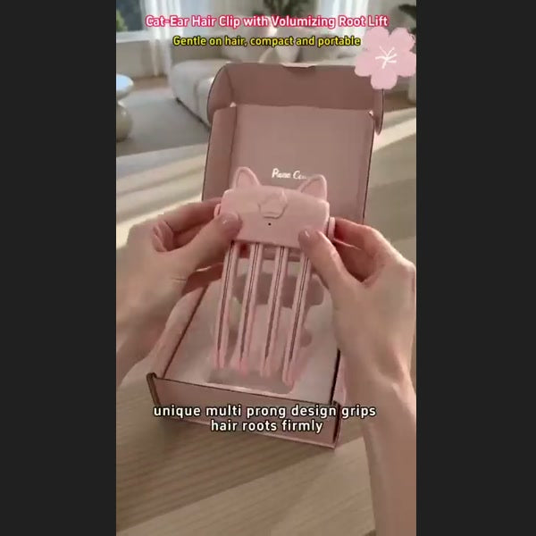 Wireless heated root-lift clip demonstrated on hair