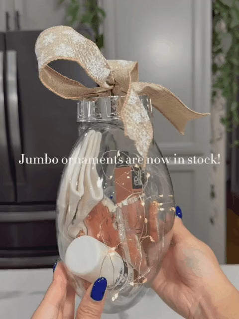 Jumbo fillable ornament filled with gifts